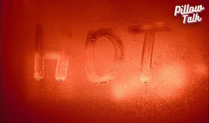 The word HOT spelled out on a red back lit, steamy piece of glass