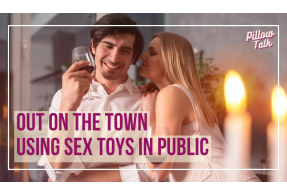 white couple sitting at a table as blond women whispers to man and he grins. A white frame surrounds the image and in magenta letters text reads "Out on the town using sex toys in public".  "Pillow Talk" in magenta cursive is in upper right corner