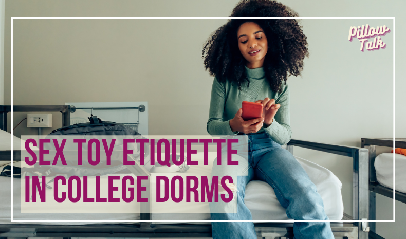 Black woman with natural, curly hair, and green sweater is sitting on top bunk of dorm bed, texting and smiling. A white frame surrounds image, text in magenta “Sex Toy Etiquette in College Dorm Rooms" in magenta cursive is in upper right corner.
