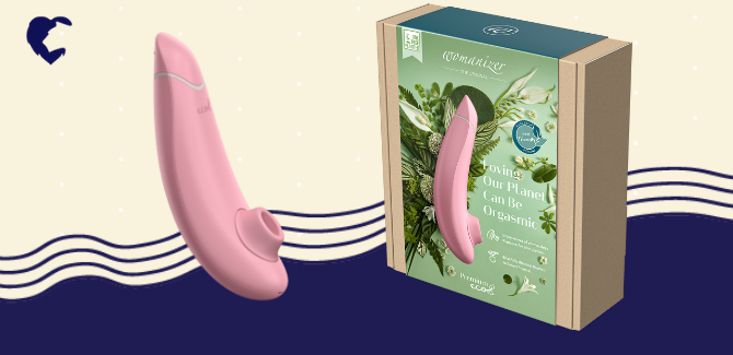 Pink womanizer premium eco [left], and kraft packaging with green and blue accents, box reads "loving our planet can be orgasmic"[right]. Background is cream with white dots, navy wave lines, and navy Lion's Den logo in top left.