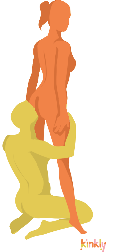 Giving partner (in yellow) is kneeling behind partner while performing oral anal pleasure to receiving partner (in orange) who is standing straight up.